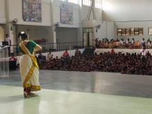 Gopika Varma on stage, addressing the children